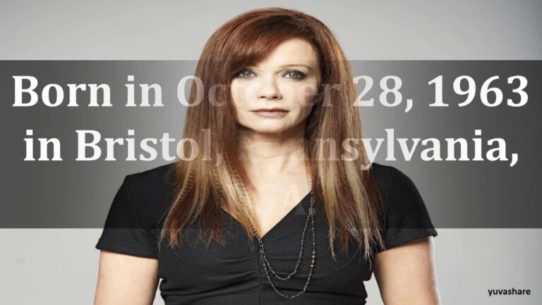 Woman with long auburn hair wearing a black shirt, standing against a gray background. Large text overlay reads: "Born in October 28, 1963 in Bristol, Pennsylvania.