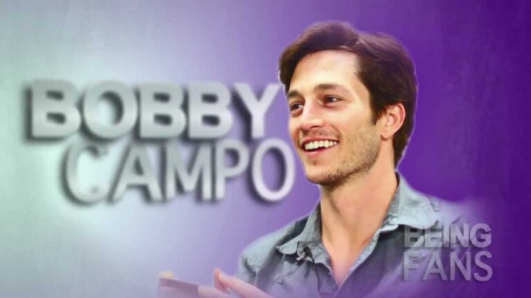 A person smiling with a purple background. Large text reads "BOBBY CAMPO.