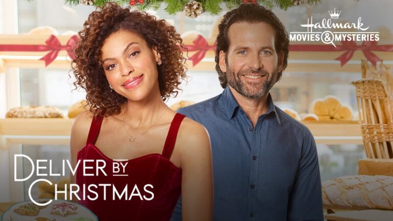 A man and woman stand smiling in front of a festive bakery display. Text reads: "Deliver by Christmas" and "Hallmark Movies & Mysteries.