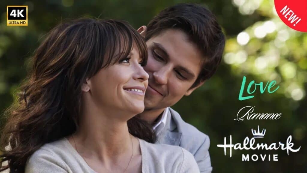 A couple smiling, with the man embracing the woman from behind. Text on image reads "Love," "Romance," and "Hallmark Movie.