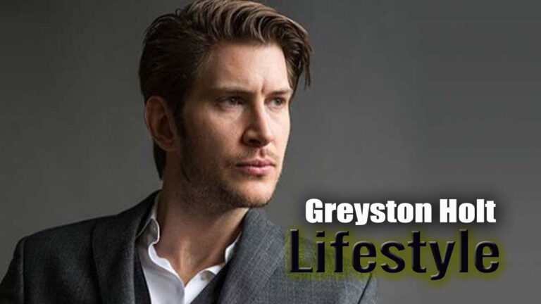 A man in a suit gazes sideways. The text reads "Greyston Holt Lifestyle" on the image.