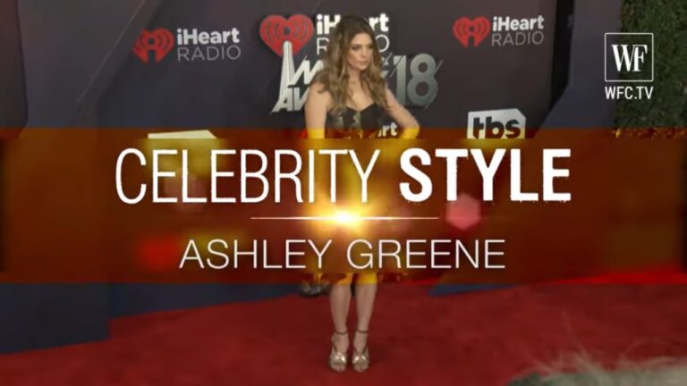 A person posing on the red carpet at a iHeartRadio event, with "Celebrity Style: Ashley Greene" text overlay.